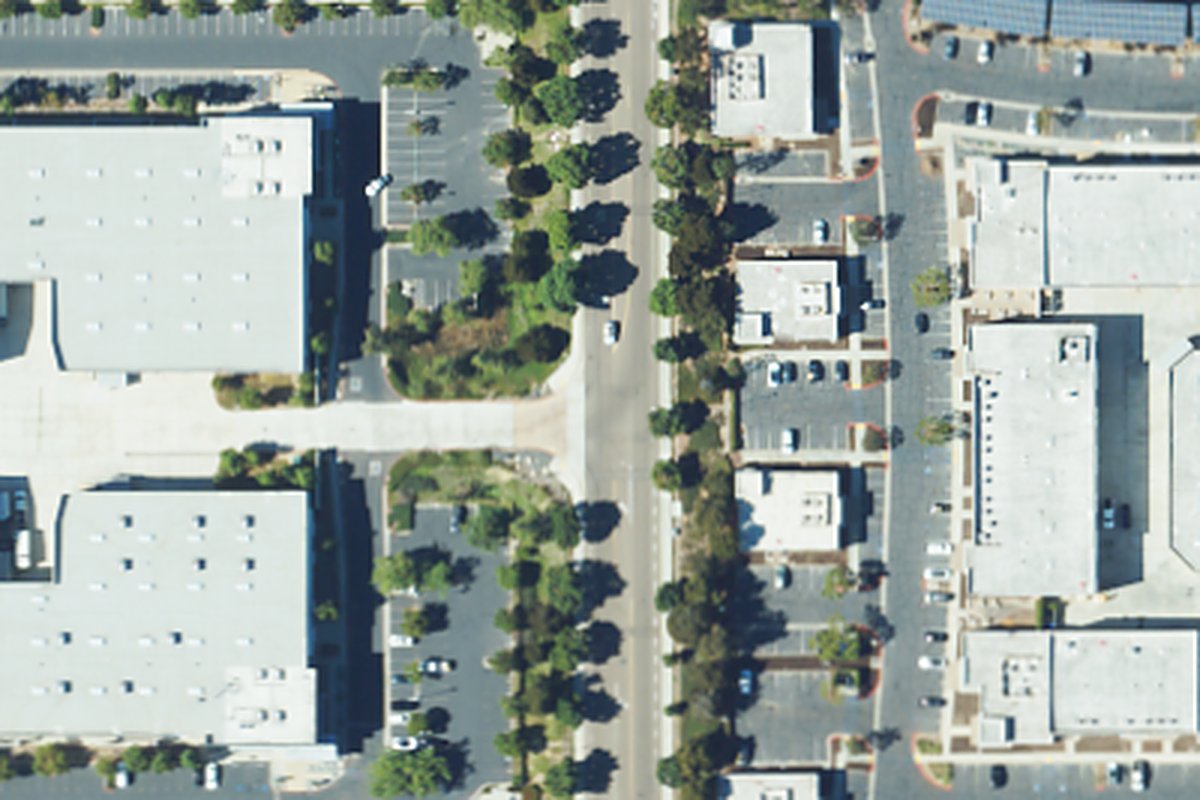 Aerial photo of Rally House Pickleball Club from August 20, 2024, with a pin on the building.